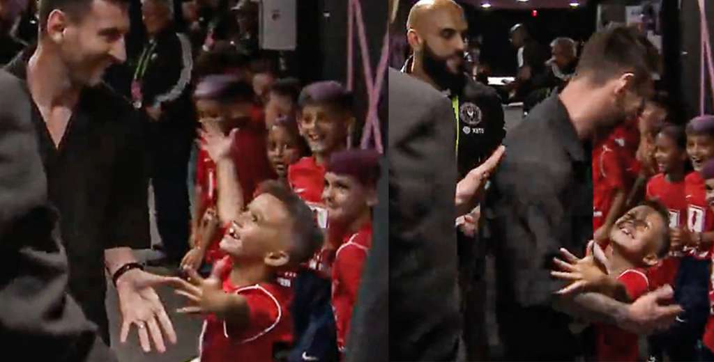 Miren esa sonrisa: un chico ve a Messi y se le tira encima a abrazarlo